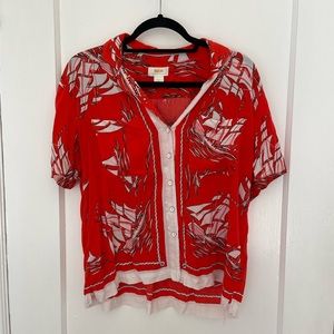 Bright red Hawaiian style shirt with boat pattern